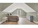 Bedroom with neutral walls, recessed lights, wood floors and a large window for natural light at 7116 Trail Ridge Ln, Indianapolis, IN 46259