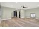 Bedroom offers wood floors, neutral walls, recessed lights and a ceiling fan at 7116 Trail Ridge Ln, Indianapolis, IN 46259
