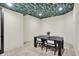 Bonus room features stylish wall paper, new carpet, and modern lighting at 7116 Trail Ridge Ln, Indianapolis, IN 46259