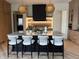 Elegant kitchen featuring a marble island, modern appliances, and stylish pendant lighting at 7116 Trail Ridge Ln, Indianapolis, IN 46259