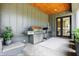 Outdoor kitchen features a stainless steel grill, cabinetry and access to interior space at 7116 Trail Ridge Ln, Indianapolis, IN 46259