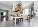Bright kitchen featuring an island with seating, stainless steel appliances, and ample cabinet space at 7182 Hunt Club Dr, Zionsville, IN 46077