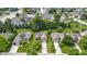 Beautiful aerial view of the home with an attached garage, driveway, and well-manicured lawns at 7335 Pymbroke Dr, Fishers, IN 46038