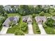 Aerial view of the home showing attached garage, driveway, and landscaping at 7335 Pymbroke Dr, Fishers, IN 46038