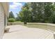 A view of the back deck showing the wood finish, railings, and access to the yard at 7335 Pymbroke Dr, Fishers, IN 46038