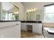 Spacious bathroom with double vanity, large mirrors, and great lighting at 7335 Pymbroke Dr, Fishers, IN 46038