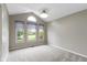Bright bedroom with neutral walls and large windows, offering ample natural light at 7335 Pymbroke Dr, Fishers, IN 46038