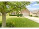 Charming brick home featuring manicured landscaping and a two-car garage at 7335 Pymbroke Dr, Fishers, IN 46038
