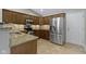 Kitchen features stainless steel appliances, granite countertops, and ample cabinet space at 7335 Pymbroke Dr, Fishers, IN 46038