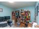 Comfortable bedroom featuring a desk area, built-in storage, and cozy decor at 829 Waldemere Ave, Indianapolis, IN 46241