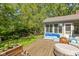 Relaxing deck featuring a cozy seating area and lovely potted plants at 8330 Claridge Rd, Indianapolis, IN 46260