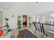 Sunroom with sliding door access and decorated with beautiful potted plants at 8330 Claridge Rd, Indianapolis, IN 46260