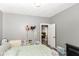 Comfortable bedroom offering neutral paint, gray accents, and natural light at 853 S Belleview Pl, Indianapolis, IN 46221