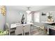 Inviting dining room featuring a modern chandelier, stylish decor, and a spacious layout at 853 S Belleview Pl, Indianapolis, IN 46221