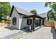 Charming home with a covered front porch and gravel landscaping, offering a blend of comfort and style at 853 S Belleview Pl, Indianapolis, IN 46221