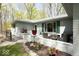 Back patio with plenty of seating and brick facade at 8581 N Goat Hollow Rd, Mooresville, IN 46158