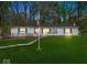 Charming single-story home featuring a well-maintained lawn, wood deck, and inviting curb appeal at 8581 N Goat Hollow Rd, Mooresville, IN 46158