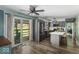 Eat-in kitchen featuring stainless steel appliances, kitchen island, and sliding doors to the backyard at 8581 N Goat Hollow Rd, Mooresville, IN 46158