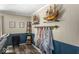 Cozy living area with unique nautical-themed decor, stylish shelves, and neutral tones at 8581 N Goat Hollow Rd, Mooresville, IN 46158