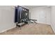 Finished basement with ping pong table and workout bench at 8635 Nolan Dr, Fishers, IN 46038