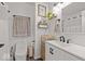 Bathroom with white vanity, updated fixtures, decor and a shower/tub combo at 8635 Nolan Dr, Fishers, IN 46038