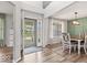 Inviting foyer with high ceilings, an open floor plan, and stylish flooring leading to dining area at 8635 Nolan Dr, Fishers, IN 46038