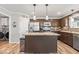 Stylish kitchen with an island, stainless steel appliances, and ample cabinet space at 8635 Nolan Dr, Fishers, IN 46038