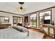 Spacious bedroom features hardwood floors, tray ceiling, and views of the large front yard at 893 W 500 S, Anderson, IN 46013