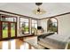 Spacious bedroom features hardwood floors, tray ceiling, and views of the large front yard at 893 W 500 S, Anderson, IN 46013