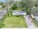 A bird's eye view of a beautiful single-story home with an attached garage at 953 W Clinton St, Danville, IN 46122