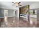 Open-concept living area featuring an electric fireplace at 953 W Clinton St, Danville, IN 46122