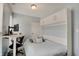 Dual-purpose bedroom with a workstation and murphy bed, offering flexibility and space-saving design at 1009 Broadway St, Indianapolis, IN 46202
