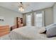 Charming bedroom featuring a ceiling fan, natural light, and soft, neutral decor for a relaxing retreat at 1009 Broadway St, Indianapolis, IN 46202