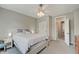 Cozy bedroom with ceiling fan and ample natural light, offering a peaceful and inviting space at 1009 Broadway St, Indianapolis, IN 46202