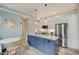 Modern kitchen with a large island, stainless steel appliances, and eat-in breakfast nook at 1009 Broadway St, Indianapolis, IN 46202