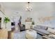 Bright living room featuring hardwood floors, modern decor, and an open layout at 1009 Broadway St, Indianapolis, IN 46202