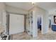 Well-organized mudroom with storage and built-ins, connecting to kitchen at 1009 Broadway St, Indianapolis, IN 46202