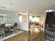 Open-concept living and dining areas flow with luxury and style at 10836 Zimmerman Ln, Indianapolis, IN 46231