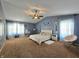 Spacious main bedroom with vaulted ceiling and large windows at 10836 Zimmerman Ln, Indianapolis, IN 46231