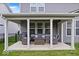 Covered patio featuring outdoor seating, a gas grill, and views of the backyard and home's exterior at 10993 Liberation Trce, Noblesville, IN 46060