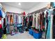 Spacious walk-in closet with ample storage and organization, fully stocked with clothes and accessories at 10993 Liberation Trce, Noblesville, IN 46060
