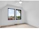 Bright bedroom with large windows, hardwood floors, and modern trim at 1100 English Ave, Indianapolis, IN 46203