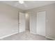 Neutral bedroom with a ceiling fan, carpet, and standard closet and doorway at 113 Spring Creek Ct, Noblesville, IN 46062