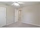 Neutral bedroom with a ceiling fan, carpet, and standard closet and doorway at 113 Spring Creek Ct, Noblesville, IN 46062
