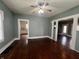 Cozy living room with hardwood floors that seamlessly connects to other spaces in the home at 1137 W 34Th St, Indianapolis, IN 46208