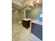 Elegant bathroom with modern tile, double vanity, and a glass-enclosed shower at 1150 Canterbury Ct # Apt D, Indianapolis, IN 46260