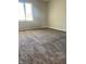 Cozy bedroom featuring wall to wall carpeting and natural light from the window at 1150 Canterbury Ct # Apt D, Indianapolis, IN 46260