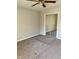 Comfortable bedroom featuring wall to wall carpeting and sliding closet doors at 1150 Canterbury Ct # Apt D, Indianapolis, IN 46260