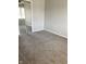 This bedroom boasts wall to wall carpeting, neutral walls, and mirrored closet doors at 1150 Canterbury Ct # Apt D, Indianapolis, IN 46260