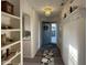 Hallway with hardwood floors leading to the kitchen at 11523 Coastal Way, Indianapolis, IN 46229